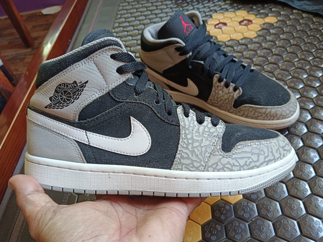 Air Jordan 1 Mid Elephant Print Size US 8 (Category: Sneakers) located in Tanauan. Submitted by joselitomariano61-66453 (Listing ID 1465589766, Image 1). Description: - Model: Air Jordan 1 Mid - Size: US 8 / UK 7 / EUR 41 - Design: Elephant print overlays on black suede and grey leather, with a striking red Jumpman logo - Condition: Clean uppers, secure laces, and soles showing minimal wear - Authenticity & Care: Well-maintained and ready to wear