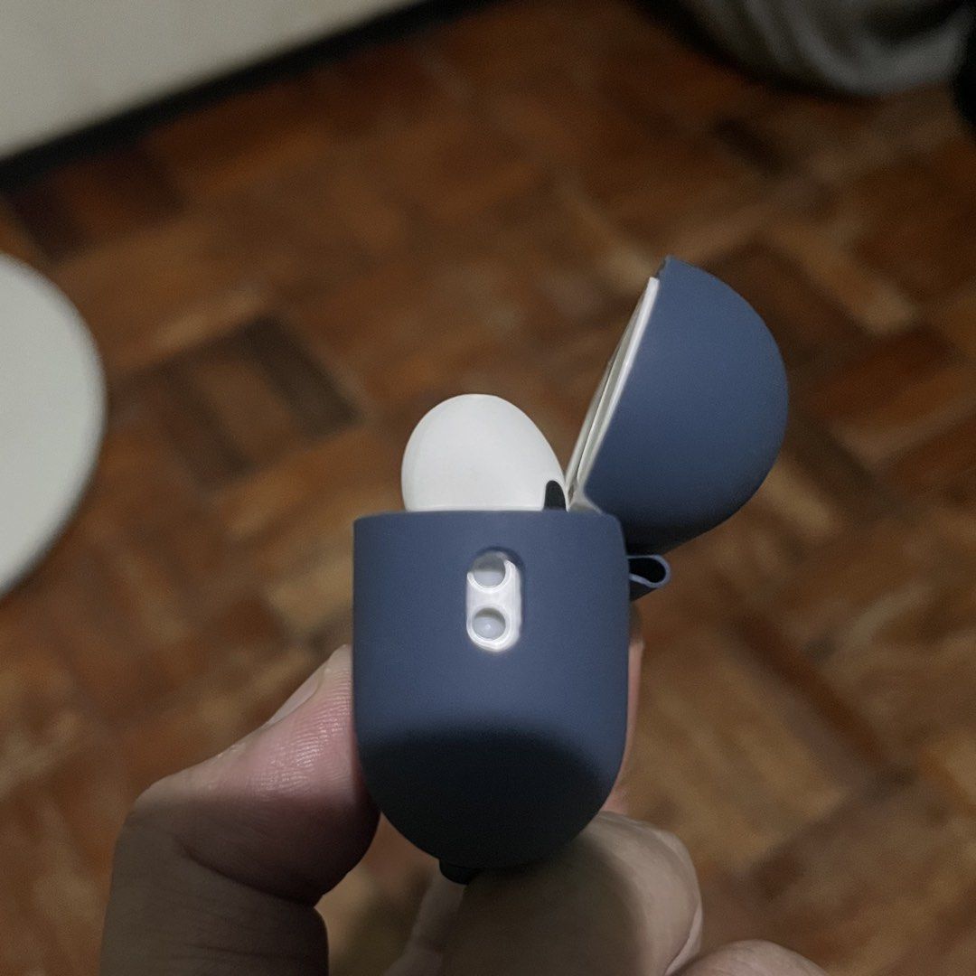 AirPods Pro 2nd Gen with Case (Category: Headphones & Headsets) located in Manila. Submitted by lo.verse (Listing ID 1465673160, Image 2). Description: Selling my preowned airpods pro 2nd gen (type c), original. Warranty expired early this yr All features working fine Still in pristine physical condition Rarely use, ive upgraded already. Airpods, dark blue case and charging case only. Location is Laspinas. Lalamove will do if malayo, ikaw magbook