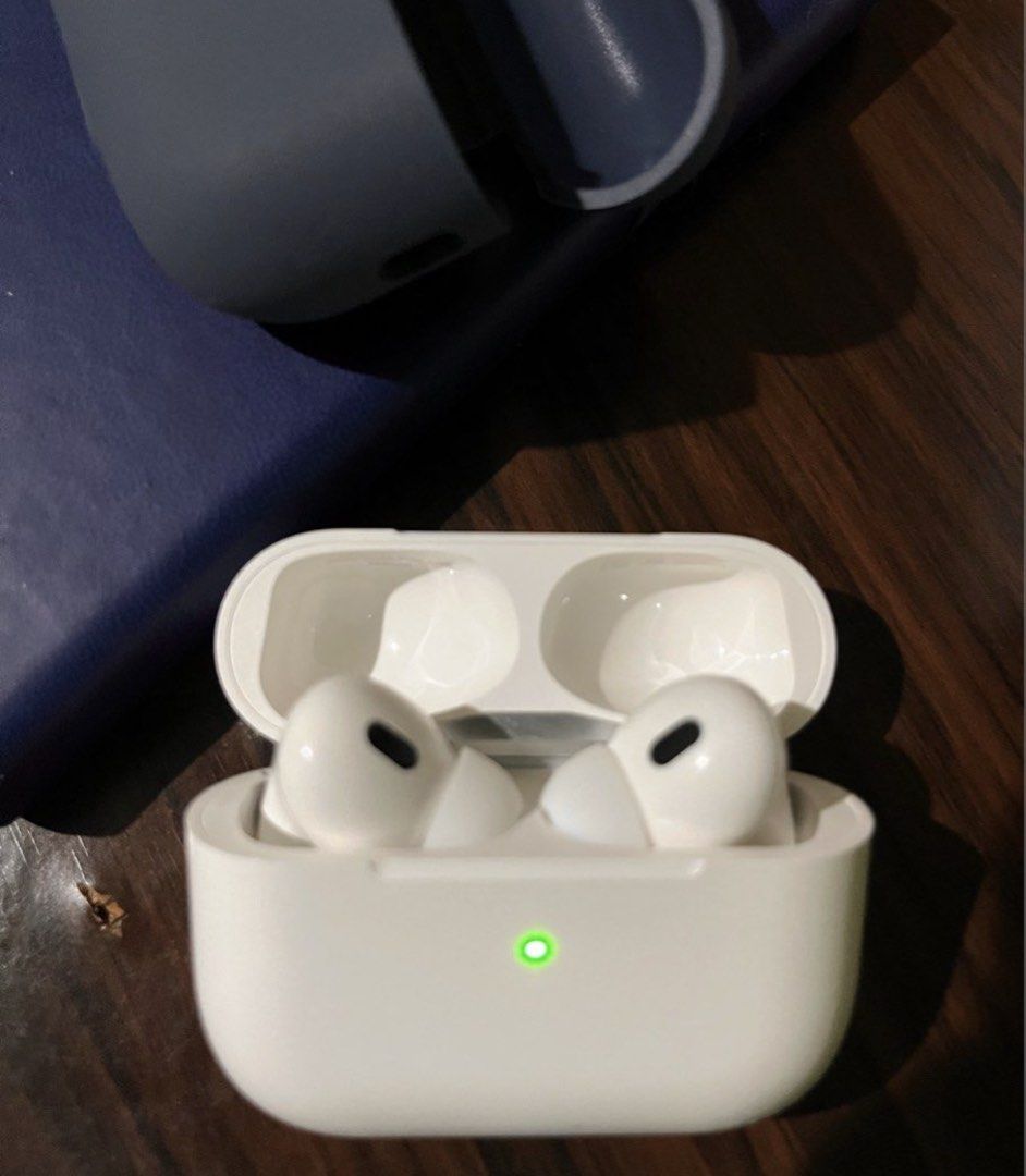 AirPods Pro 2nd Gen with Case (Category: Headphones & Headsets) located in Manila. Submitted by lo.verse (Listing ID 1465673160, Image 3). Description: Selling my preowned airpods pro 2nd gen (type c), original. Warranty expired early this yr All features working fine Still in pristine physical condition Rarely use, ive upgraded already. Airpods, dark blue case and charging case only. Location is Laspinas. Lalamove will do if malayo, ikaw magbook