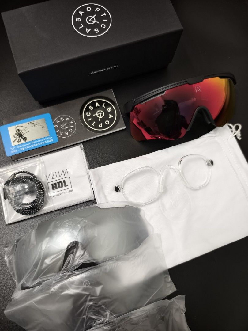 Alba Optics Sunglasses with Multiple Lenses and Box (Category: Sunglasses & Eyewear) located in Angeles City. Submitted by measaliman02351 (Listing ID 1465599225, Image 3). Description: - Authentic Alba Optics sunglasses set - Frame color: Black with red mirrored lens - Includes 3 extra brand new, sealed lenses - Comes with optical clip-on frame for graded lenses - Accessories included: Strap, cleaning cloth, and polarization test card - Complete