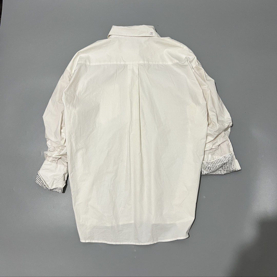 Alexander Wang - Shirt - Crystal Cuffs (Category: Shirts) located in Cavite. Submitted by asianluxe (Listing ID 1465702100, Image 3). Description: ALEXANDERWANG-SHIRT-CRYSTAL CUFFS FLAT MEASUREMENTS! Length:29 inches Width:23.5 Shoulder to shoulder:22 inches Sleeve:17 inches Hem: 24 inches (Guaranteed authentic) Good condition Very presentable 9/10 condition Flaw: Check the pics need wash! But still good condition Composition! 100% Cotton.