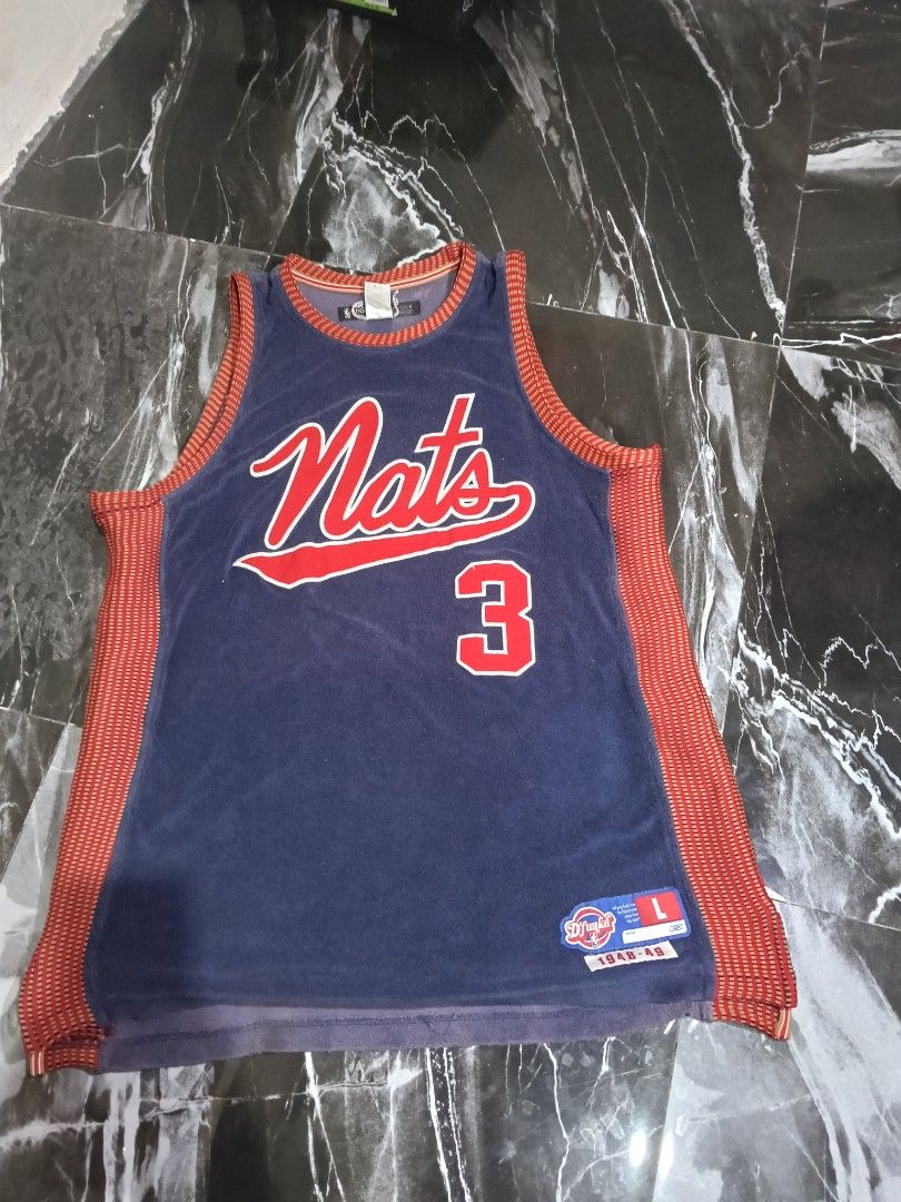 Allen Iverson Syracuse Nationals Throwback Jersey Size L (Category: Activewear) located in Manila. Submitted by jahwang1973 (Listing ID 1465610291, Image 2). Description: - Player/Edition: Allen Iverson Syracuse Nationals 1948-49 Throwback Jersey - Material: Unique blue velvet-like fabric with red and gold mesh side panels - Design: Bold 'Nats' logo across the chest with red and white striping - Details: Number 3 on front and back, with 'IVERSON'