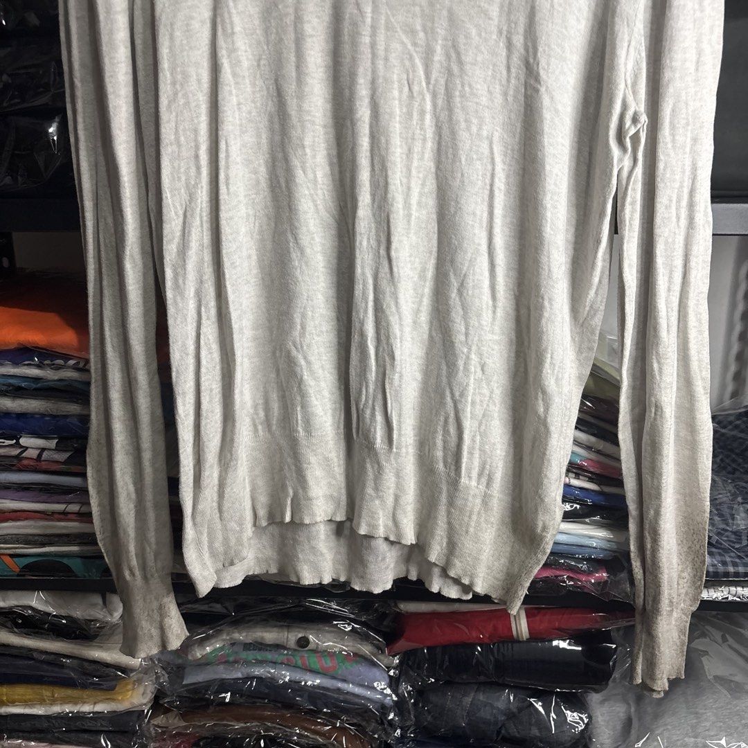 AllSaints Spitalfields - Devise Scoop Long Sleeve Sweater (Category: Longsleeves) located in Cavite. Submitted by goodstayojan.cvt (Listing ID 1465718780, Image 2). Description: All Saints - Knitted Longsleeve L on tag(18 x 27.5 x 26) Good Condition Flaw: Stains, hole at the shoulder, see setailed pics - Brand/Model: AllSaints Spitalfields Devise Scoop Knit Sweater - Color: Greyish cream - Size: Large (Regular fit) - Material: 100% lightweight co
