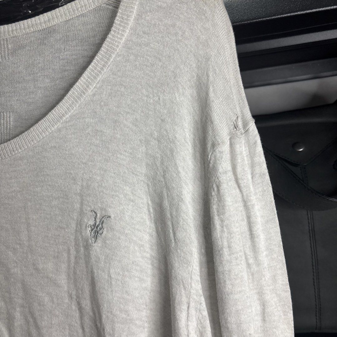 AllSaints Spitalfields - Devise Scoop Long Sleeve Sweater (Category: Longsleeves) located in Cavite. Submitted by goodstayojan.cvt (Listing ID 1465718780, Image 3). Description: All Saints - Knitted Longsleeve L on tag(18 x 27.5 x 26) Good Condition Flaw: Stains, hole at the shoulder, see setailed pics - Brand/Model: AllSaints Spitalfields Devise Scoop Knit Sweater - Color: Greyish cream - Size: Large (Regular fit) - Material: 100% lightweight co