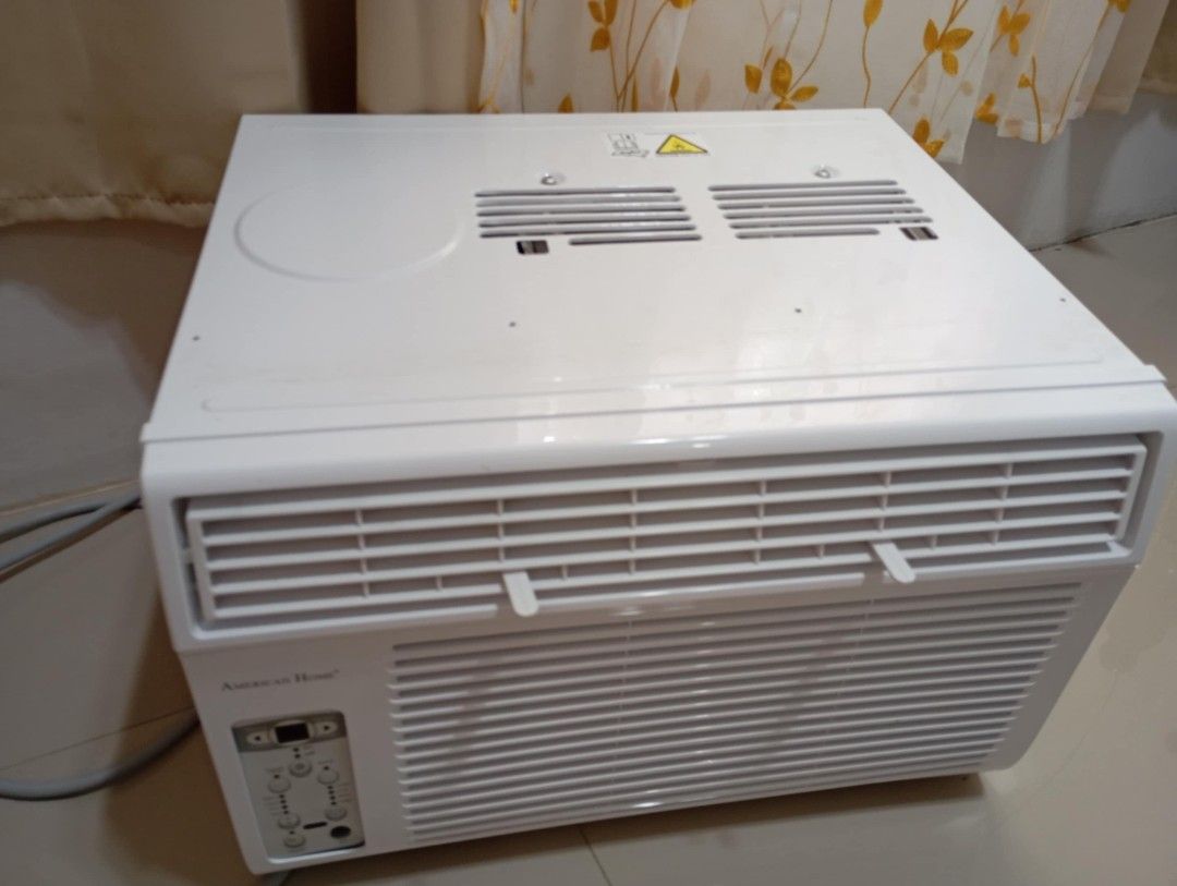 American Home Window Type Air Conditioner (Category: Air Conditioning and Heating) located in Quezon City. Submitted by aezie (Listing ID 1465605804, Image 1). Description: - American Home window type air conditioner - White unit with front vents and control panel - Effectively cools down rooms - Easy to install in a window frame - Ideal for bedrooms or small living spaces - Selling because I'm moving out. -Slightly negotiable pm your offers than