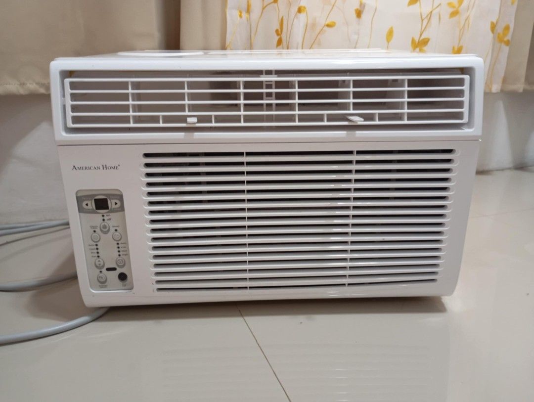 American Home Window Type Air Conditioner (Category: Air Conditioning and Heating) located in Quezon City. Submitted by aezie (Listing ID 1465605804, Image 3). Description: - American Home window type air conditioner - White unit with front vents and control panel - Effectively cools down rooms - Easy to install in a window frame - Ideal for bedrooms or small living spaces - Selling because I'm moving out. -Slightly negotiable pm your offers than