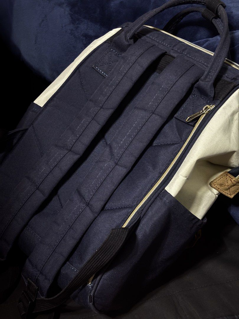 Anello Kuchigane Tri-Color Multi-Color Canvas Bag Backpack (Category: Backpacks) located in Pulilan. Submitted by shane_malik (Listing ID 1465623786, Image 2). Description: PRE-LOVED ANELLO BACKPACK bought last year, seldom used (negotiable) - Brand: Anello - Style: Canvas backpack in cream, navy blue, and red color block - Handles: Double top handles with snap button closure - Straps: Comfortable padded shoulder straps - Access: Handy back zip a