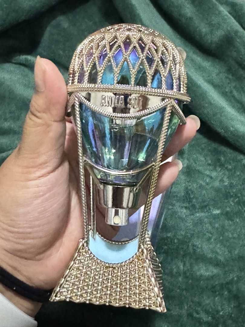 Anna Sui Cosmic Sky Eau De Toilette 75ml (Category: Fragrance & Deodorants) located in Marikina City. Submitted by virgo.bb (Listing ID 1465748563, Image 3). Description: - Authentic Anna Sui Cosmic Sky Eau de Toilette (75ml) - Stunning hot air balloon bottle design in iridescent blue and gold - Sweet and whimsical fragrance profile - Includes original holographic outer box - Spray nozzle is in perfect working condition - Well-kept and ready to s