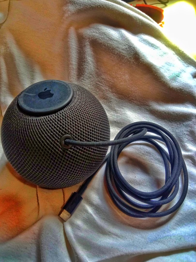 Apple HomePod mini Space Grey aw (Category: Soundbars, Speakers & Amplifiers) located in Cebu City. Submitted by catanaa (Listing ID 1465749340, Image 1). Description: - Color: Space Grey - Design: Compact spherical shape with seamless mesh fabric - Controls: Touch surface with backlit audio controls - Power: Attached braided USB-C cable included - Features: Siri voice control, room-filling sound, Apple ecosystem integration - Condition: Clean, t