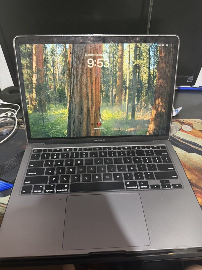 Apple MacBook 2020 I5 Air Space Grey (Category: Laptops & Notebooks) located in Manila. Submitted by gbrail_achi (Listing ID 1465608942, Image 2). Description: - Color: Sleek Space Grey with iconic Apple logo - OS: Running the latest macOS Sequoia - Keyboard & Trackpad: Responsive black keyboard layout and standard trackpad - Condition: Fully functional screen and body - Design: Slim profile with standard rubber feet and bottom screws intact.