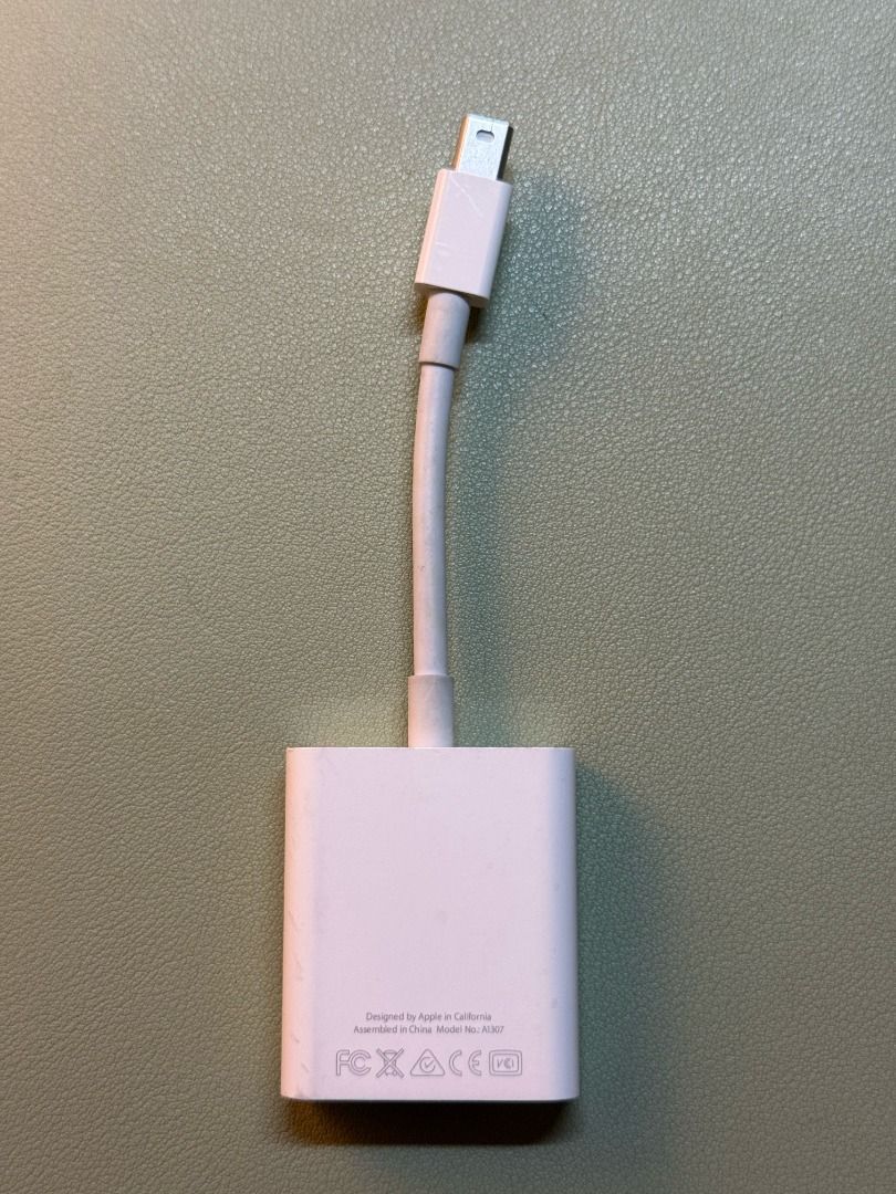 Apple: Mini DisplayPort to VGA Adapter (A1307) (Category: Cables & Adaptors) located in Taguig. Submitted by jilinlin (Listing ID 1465724548, Image 2). Description: details: — legit; bought from saudi — old (pre-pandemic) — haven't used or tested since before 2018; didn't use much (for hs presentation purposes only iirc) — no box — price is still negotiable; willing to sell for a lower price na since prio na ma-declutter at home; paunahan nalang 