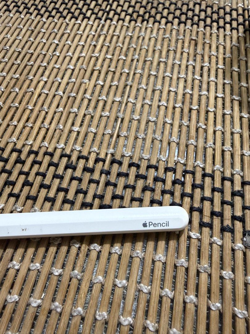 Apple Pencil (2nd Generation) (Category: iPad) located in Dasmarinas. Submitted by wisdomismyname (Listing ID 1465698828, Image 2). Description: - Genuine Apple Pencil (2nd Generation) - Includes newly replaced Apple pencil tip and silicone cover Honest Condition: Minor scuffs and marks along the body and slightly bent as seen in photos Disclaimer: My iPad Pro broke 2 months ago so this was last used around mid-August 2026. Fully functional at th