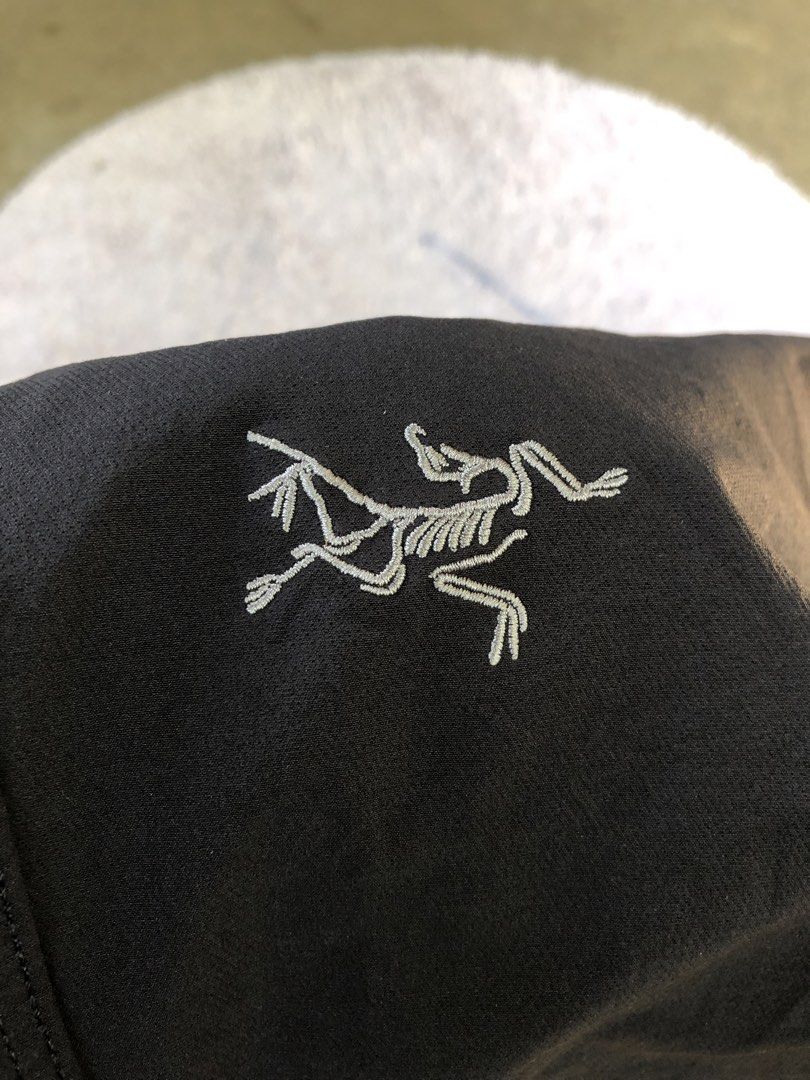 Arc'teryx Black Technical Hiking Pants (Category: Trousers) located in Montevista. Submitted by rdthriftshub (Listing ID 1465595041, Image 3). Description: - Brand: Arc'teryx - Color: Black - Material: Durable and stretchy fabric for outdoor movement - Features: Embroidered thigh logo, secure YKK zippered pockets and fly, snap button closure with debossed branding - Condition: Clean finish throughout, perfect for trail use and daily wear - Shippi