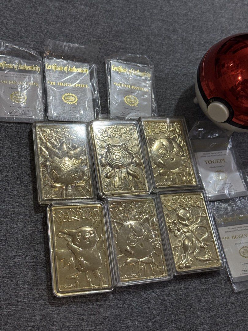 Assorted characters (Category: Raw Singles) located in Puerto Princesa. Submitted by twentythrifts.apparel (Listing ID 1465624200, Image 2). Description: - Set of 6 stunning 23 karat gold-plated Pokémon trading cards - Features fan favorites: Pikachu, Mewtwo, Jigglypuff, Poliwhirl, and Togepi - Each card is sealed in a protective acrylic case - Includes original Certificate of Authenticity for every card - Comes in a collectible red Pokéball cont