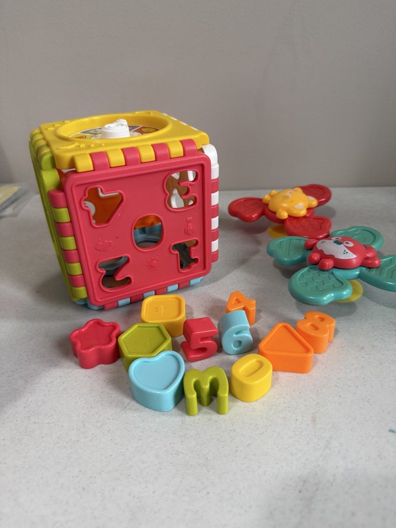 Assorted Kids’ Toys Bundle – Animals, Shape Sorter & Learning Toys (Category: Kids Toys) located in Taytay. Submitted by thestyletwins (Listing ID 1465618261, Image 2). Description: Selling a bundle of assorted toddler toys, perfect for pretend play, learning shapes/numbers and keeping little ones busy. All are preloved and may have normal signs of use. Selling as a set as we’re decluttering. Includes: * 8 cute animal figures — 2 monkeys, 2 eleph
