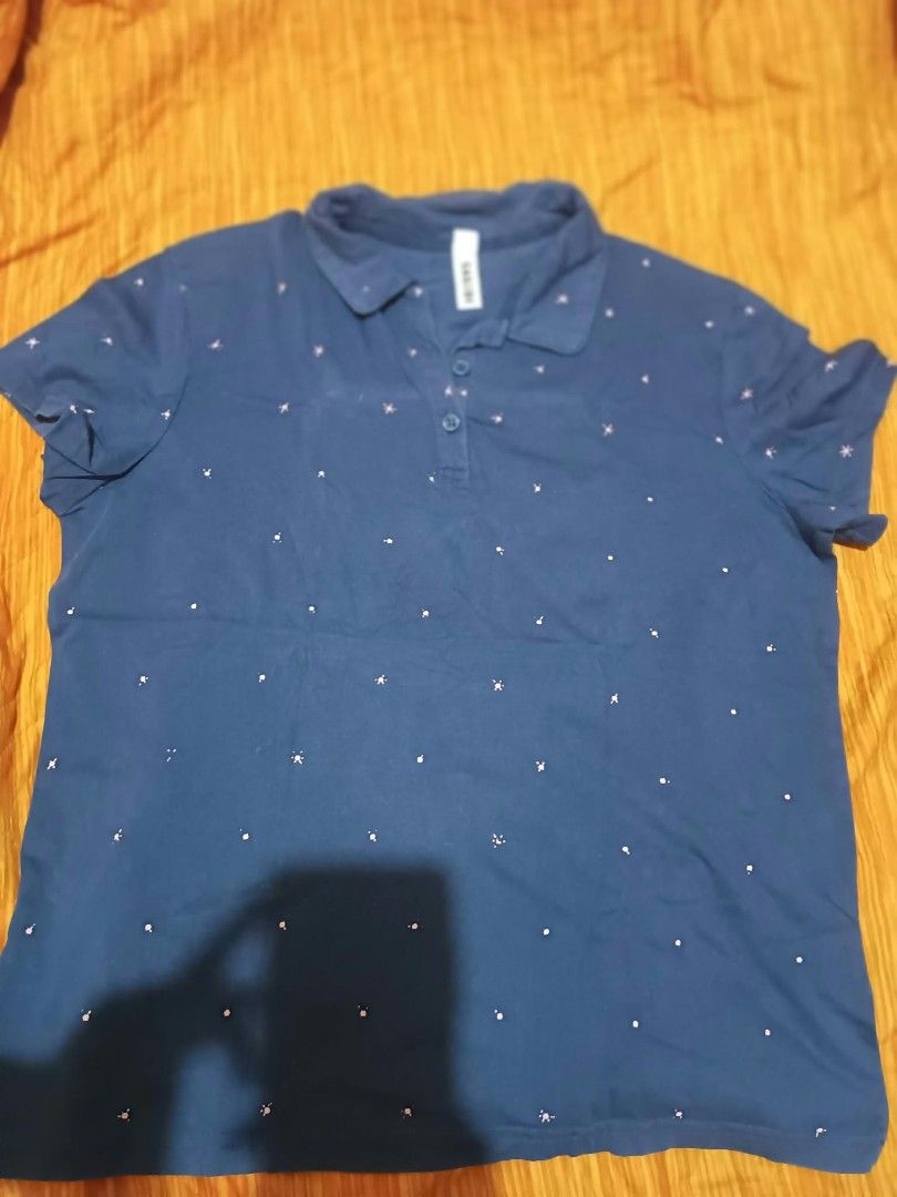 Assorted Polo Shirts Bundle (Category: Shirts) located in Manila. Submitted by raizel1997 (Listing ID 1465592144, Image 1). Description: 5 polo shirts in different colors and patterns. Includes blue with white dots, black with pink stripes, solid green, green with white stripes, and pink with a white moose logo. Short sleeves, standard collars, button-up fronts. Assorted brands like Herbench and Bobson. Comfortable everyday casual wear. Easy to m