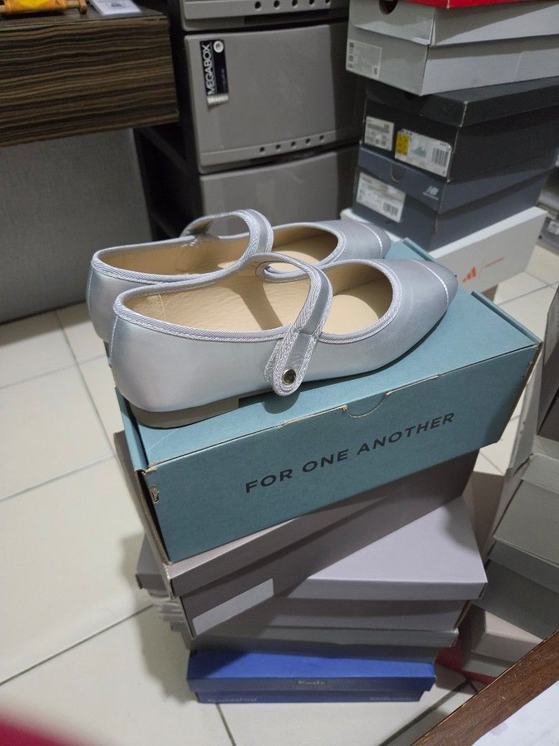 ASTRID Silver Mary Jane Flats (Category: Flats & Sandals) located in Pasig City. Submitted by cheribomb85 (Listing ID 1465755683, Image 2). Description: - Style: Silver Mary Jane flats with pointed toe - Closure: Easy-to-use ankle strap with Velcro - Details: Clean beige inner lining with Astrid branding - Packaging: Comes with original For One Another shoebox - Condition: Excellent, simple, and easy to slip on.