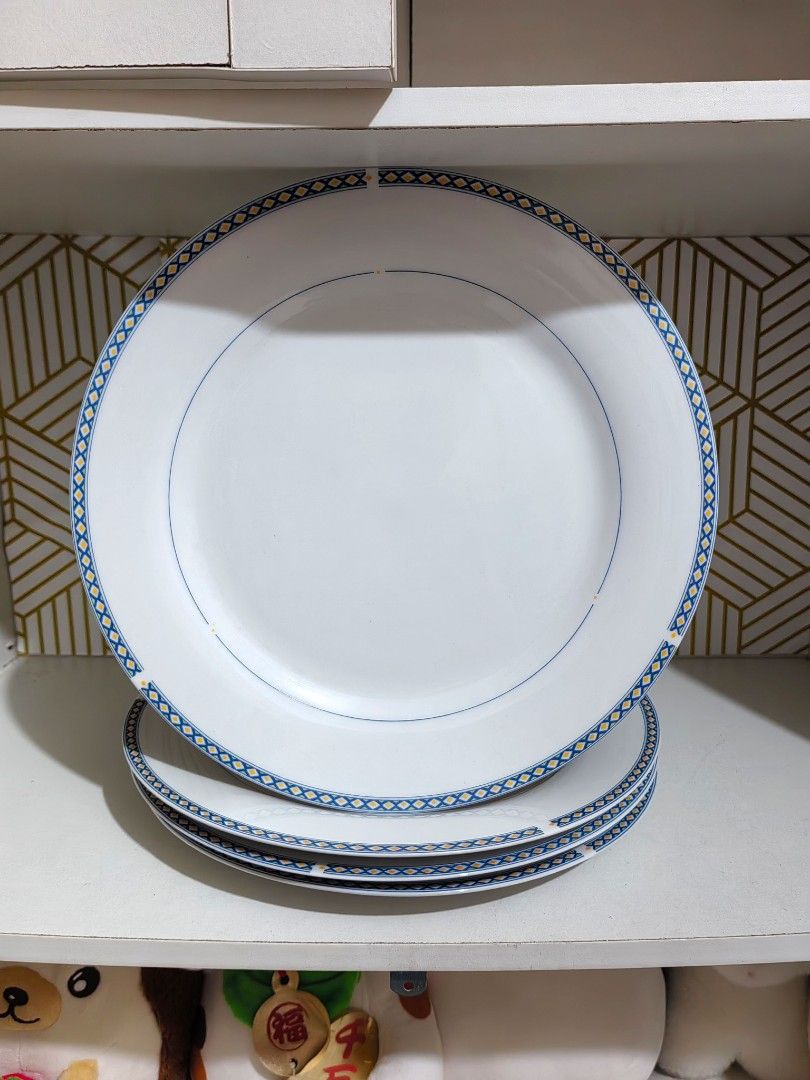 Athena Fine Porcelain Cup and Plate Dinnerware Set (Category: Dinnerware & Cutlery) located in San Jose del Monte. Submitted by chimkenugets (Listing ID 1465688510, Image 2). Description: Athena Fine Porcelain dinnerware in white with a blue and yellow lattice border and thin blue accent line. Microwave and dishwasher safe Set includes: 4 dinner plates, approx. 10.5 in / 27 cm 3 saucers / side plates 1 cup , approx. 3.5 in / 9 cm across the rim C