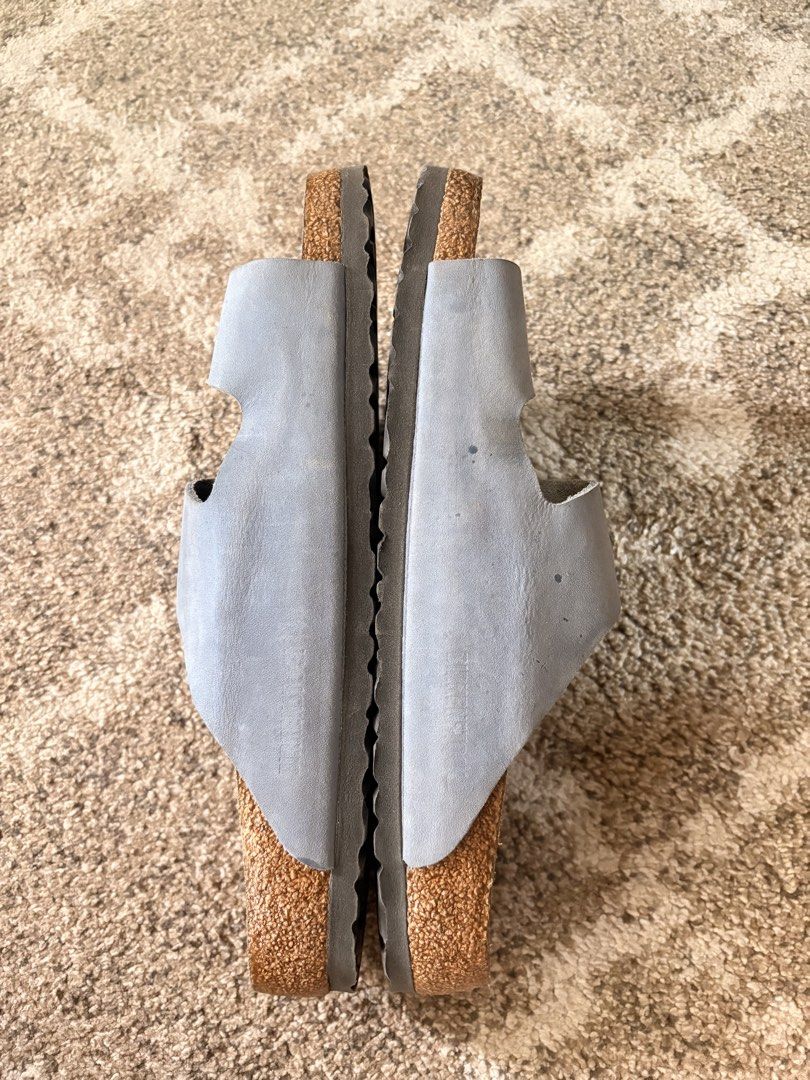 Auth Preloved Birkenstock Arizona (Category: Slippers & Slides) located in Paranaque City. Submitted by silentstone.dolphin (Listing ID 1465635574, Image 3). Description: Oiled Leather Material.. Color Blue.. Brass Buckle.. Visible Print.. Size 44 RF.. Clean&Ready to Wear✅ Super Gwapo in Actual😍.