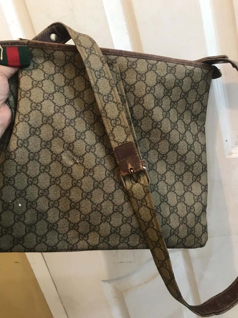 Auth Vintage Gucci Web Stripe sling Bag (PROJECT) (Category: Cross-body Bags) located in Midsayap. Submitted by purse_gedo (Listing ID 1465610437, Image 3). Description: - Brand: Gucci Vintage - Material: Classic GG Monogram Canvas with Brown Leather Trim - Design: Iconic Green & Red Web Stripe Accent - Closure & Strap: Zip Top Closure with Adjustable Leather Strap - Interior: Canvas Lining with Slip Pocket & Leather Brand Patch - Condition: Heav