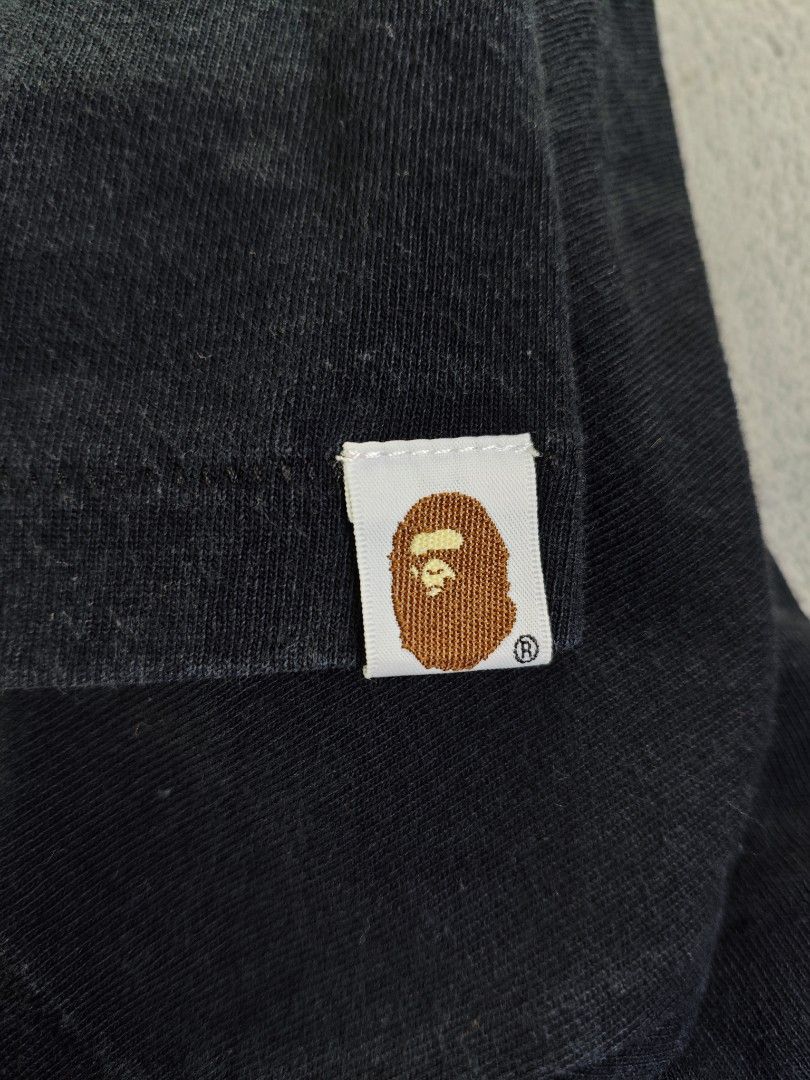 Authentic Bape Shark Logo Black Tee (Authentic/Legit) (Category: Tshirts & Polo Shirts ) located in San Pedro. Submitted by chronothrift (Listing ID 1465652940, Image 3). Description: - Size: XL (W22.5 x 30L) - Condition: 9.2/10 - Color Rate: 8.7/10 - Flaws: ❌❌❌ MOD: J&T Express / Lalamove / Meet MOP: Gcash / Bank Transfer.
