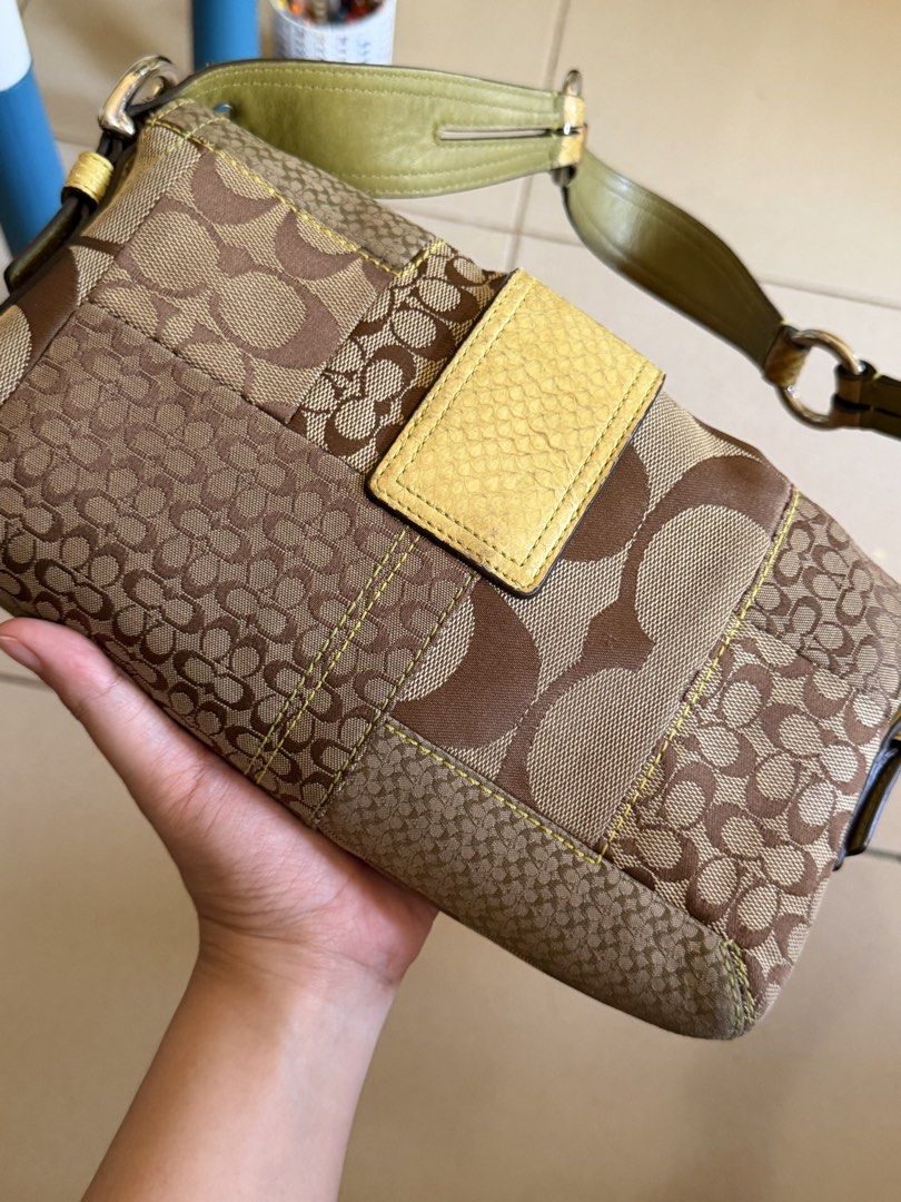 Authentic Coach Bag (Category: Shoulder Bags) located in Manila. Submitted by crstneeee (Listing ID 1465600825, Image 3). Description: - 100% Authentic Coach shoulder bag - Unique brown signature monogram patchwork design - Accented with yellow suede and python-embossed leather details - Bright yellow fabric interior lining with organized slip and zip pockets - Features official Coach creed and serial number patch (No. C050-3689) - Perfect statem