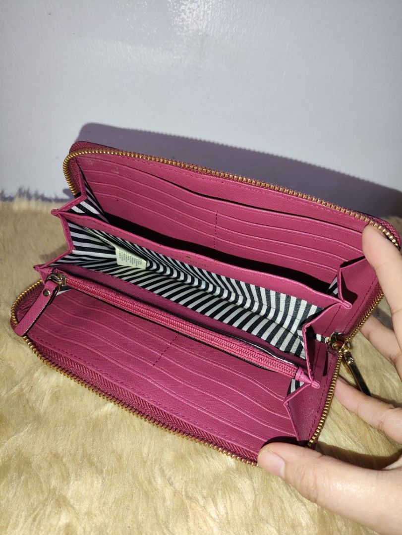 Authentic Kate Spade Lacey zip around long wallet (Category: Wallets & Card holders) located in Rizal. Submitted by hsiri1128 (Listing ID 1465668921, Image 3). Description: 💯✔️Legit CONDITION : 8/10 ISSUE / FLAWS : Normal signs of wear only MATERIAL : Saffiano leather w/ gold hardwares DETAILS : ykk zip. fit promax inside.