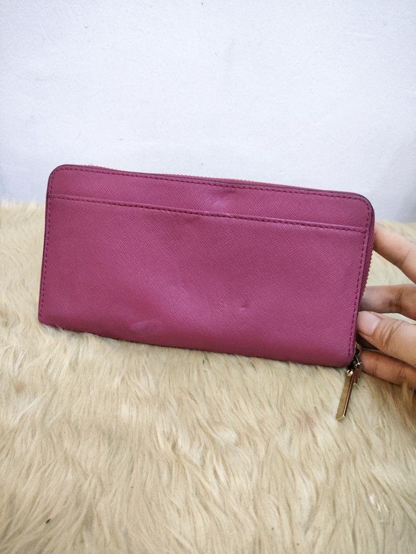 Authentic Kate Spade Lacey zip around long wallet (Category: Wallets & Card holders) located in Rizal. Submitted by hsiri1128 (Listing ID 1465668921, Image 2). Description: 💯✔️Legit CONDITION : 8/10 ISSUE / FLAWS : Normal signs of wear only MATERIAL : Saffiano leather w/ gold hardwares DETAILS : ykk zip. fit promax inside.