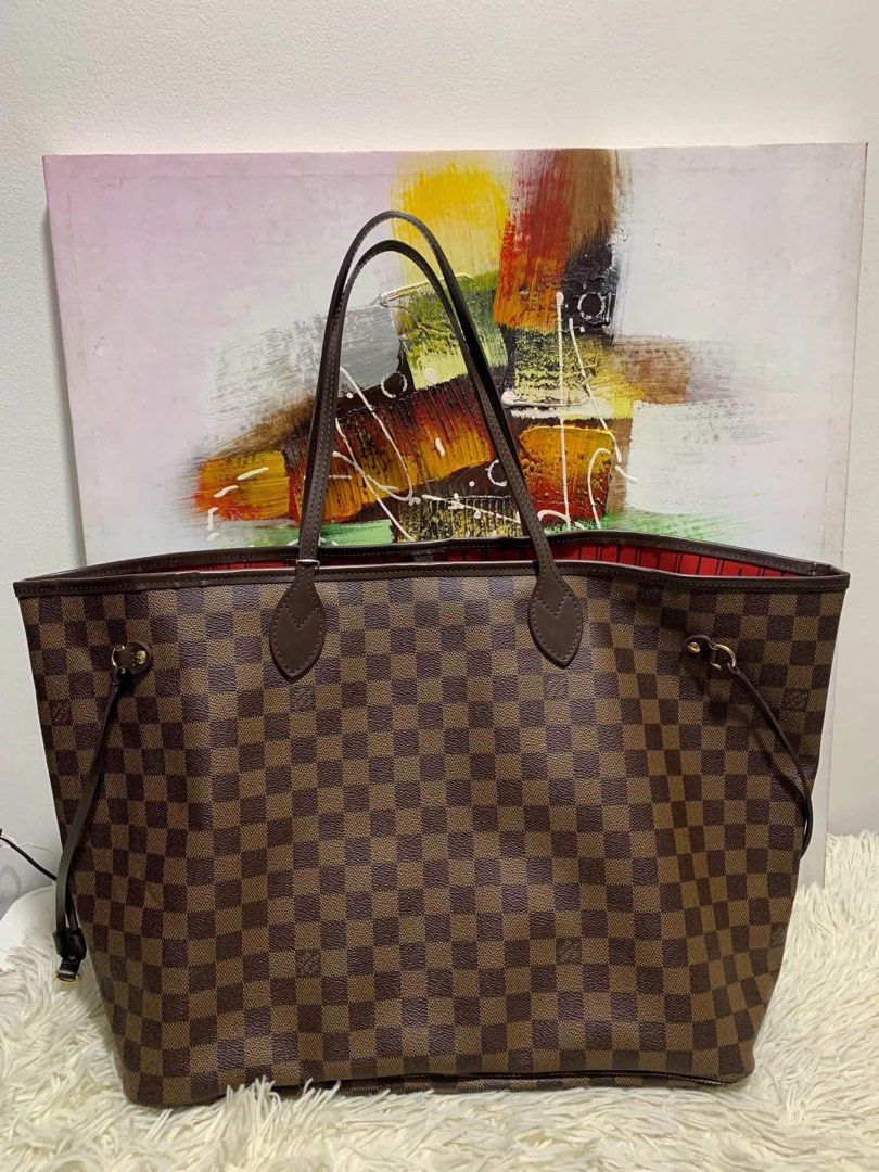 Authentic Louis Vuitton (Category: Luxury Bags & Wallets) located in Manila. Submitted by chloe_luxuries (Listing ID 1465593530, Image 1). Description: Guaranteed Original Louis Vuitton Neverfull Gm size Damier Still in very good condition No more inclusion bag only Pm for more details .