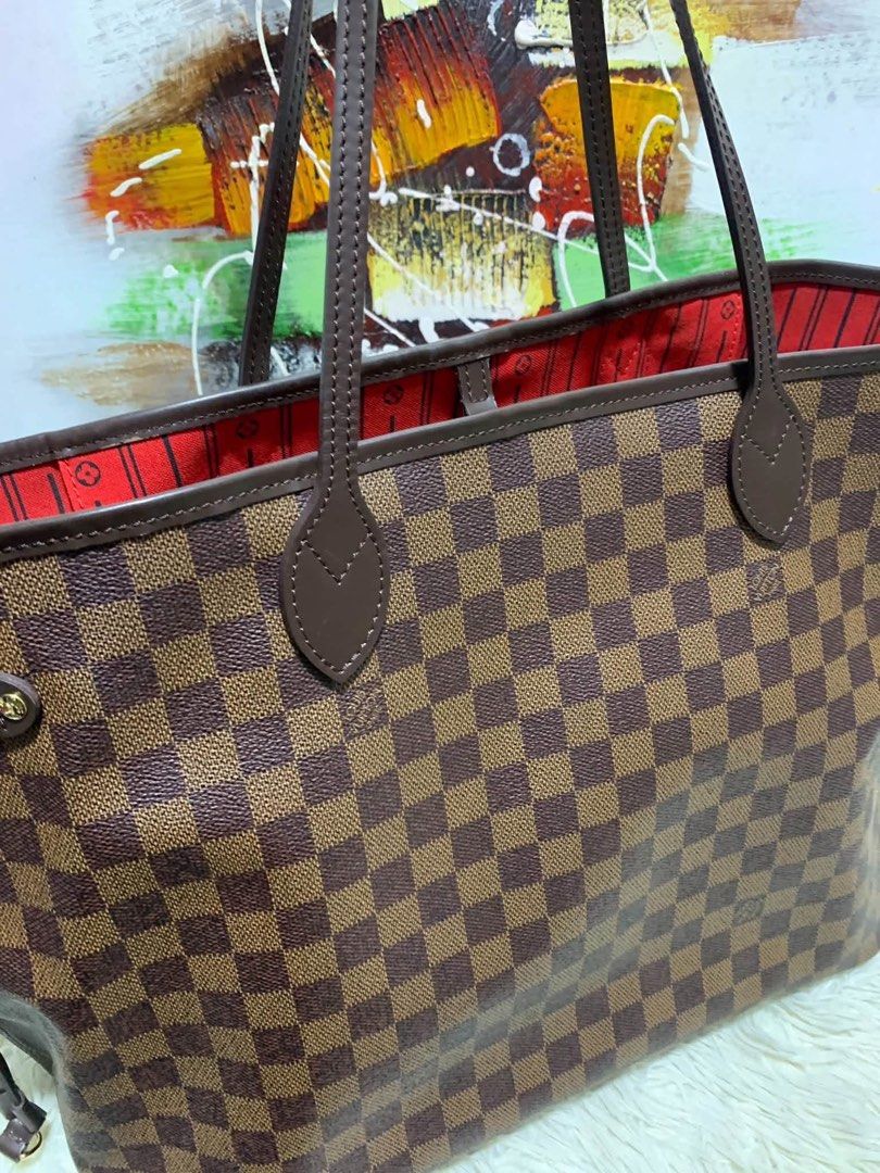 Authentic Louis Vuitton (Category: Luxury Bags & Wallets) located in Manila. Submitted by chloe_luxuries (Listing ID 1465593530, Image 3). Description: Guaranteed Original Louis Vuitton Neverfull Gm size Damier Still in very good condition No more inclusion bag only Pm for more details .