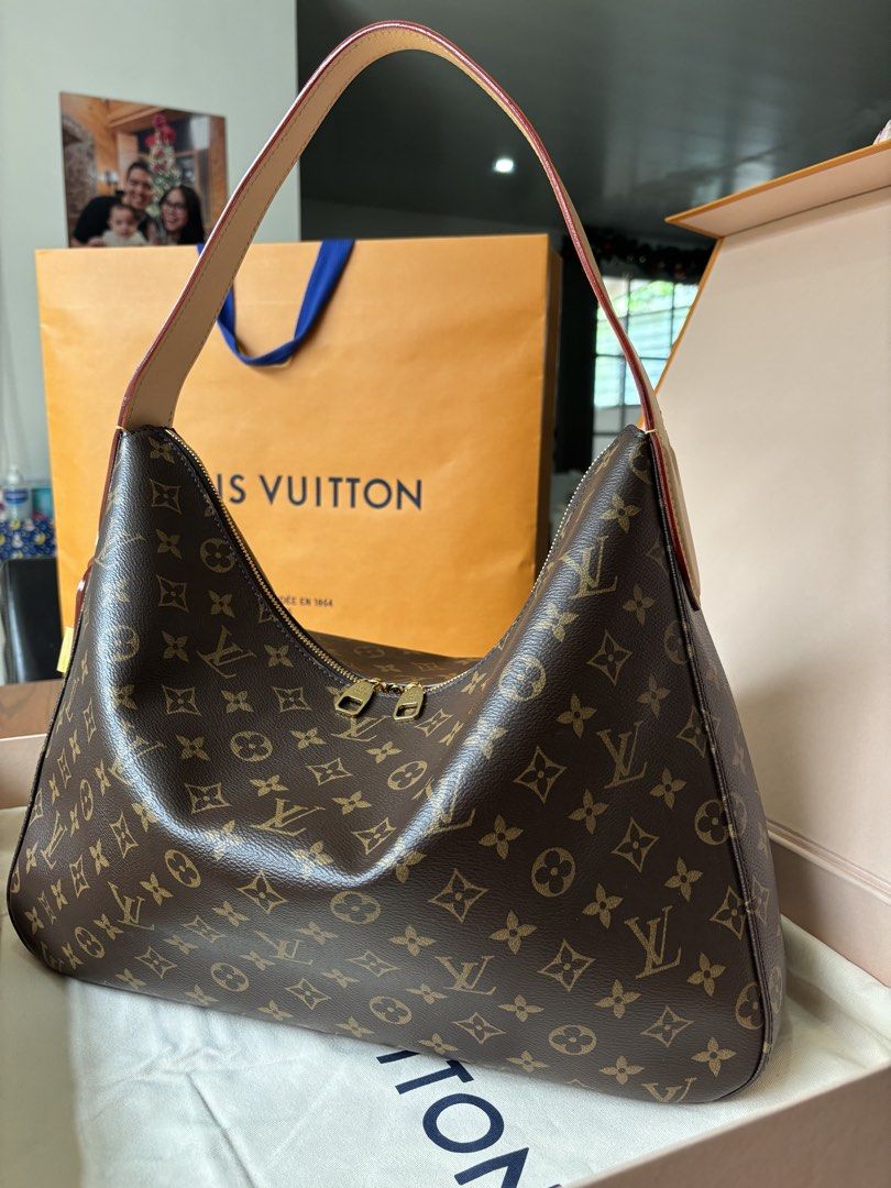 Louis Vuitton Slouchy MM (Category: Luxury Bags & Wallets) located in Pasig City. Submitted by tcrealtysolutions (Listing ID 1465706266, Image 3). Description: 100% Authentic Monogram Louis Vuitton Slouchy MM, personally purchased in Milan. This model is not readily available in PH Market❗️ * Fall/Winter 2024 collection * Distinctive, modern silhouette that stands out from classic Neverfull and Speedy styles, Less commonly seen, making it a more 
