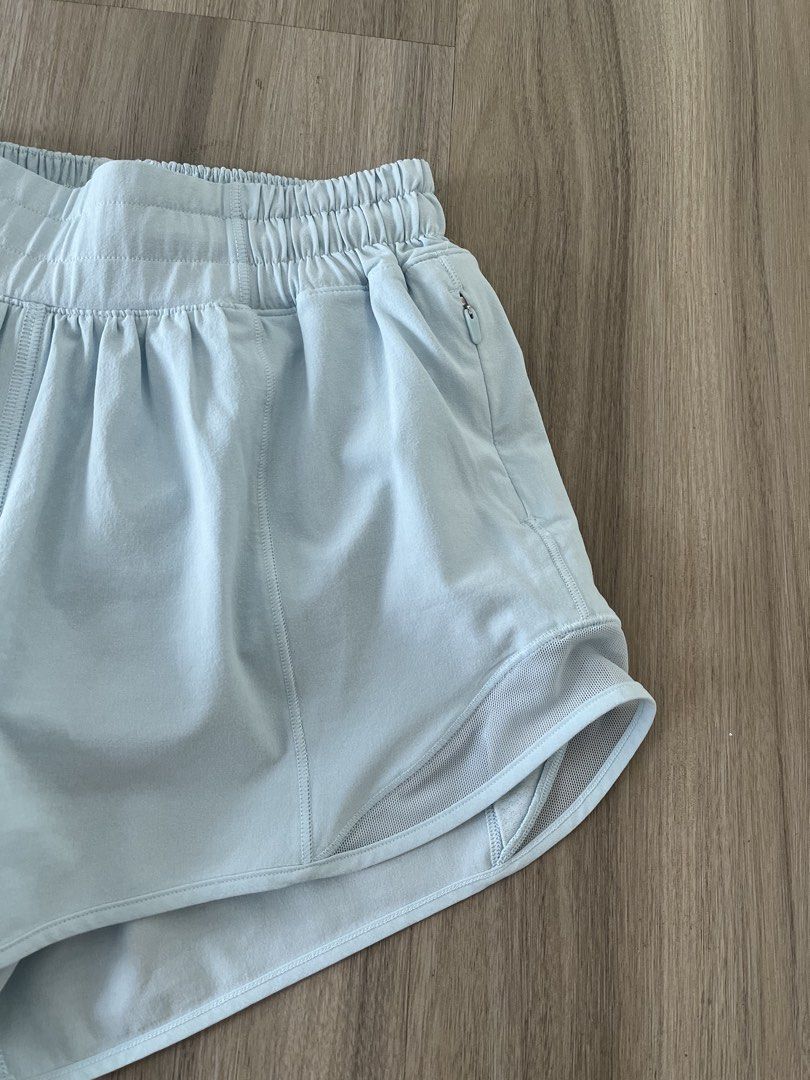 Authentic Lululemon Hotty Hot Shorts 2.5 Light Blue Size 2 (Category: Shorts) located in Taguig. Submitted by prelovedcloset2 (Listing ID 1465606785, Image 3). Description: - Brand: Lululemon - Style: Hotty Hot Shorts - Color: Light Blue - Size: 2 - Features: Breathable side mesh panels, convenient right-hip zipper pocket, built-in liner - Fit: Elastic waistband with adjustable interior drawstring - Ideal for: Running, workouts, and casual wear -