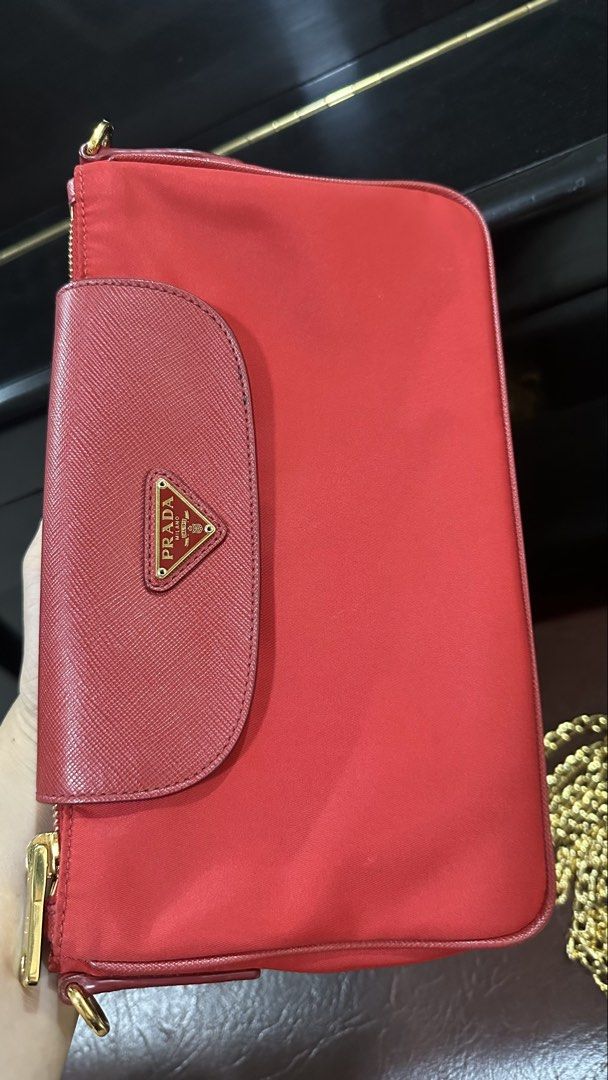 Authentic Prada Nylon Chain Sling Bag (Category: Luxury Bags & Wallets) located in Las Pinas. Submitted by marshmallowmax (Listing ID 1465615800, Image 2). Description: Guaranteed Authentic! Slightly used.. no flaws. With dustbag and cards.