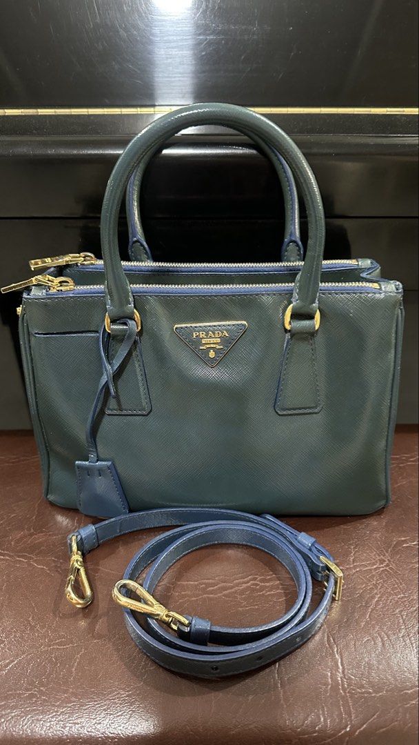 Authentic Prada Saffiano Lux Double Zip Small (Category: Luxury Bags & Wallets) located in Las Pinas. Submitted by marshmallowmax (Listing ID 1465598201, Image 1). Description: Guaranteed Authentic! Excellent used, minimal signs of usage only No more inclusions but will provide generic dustbag.