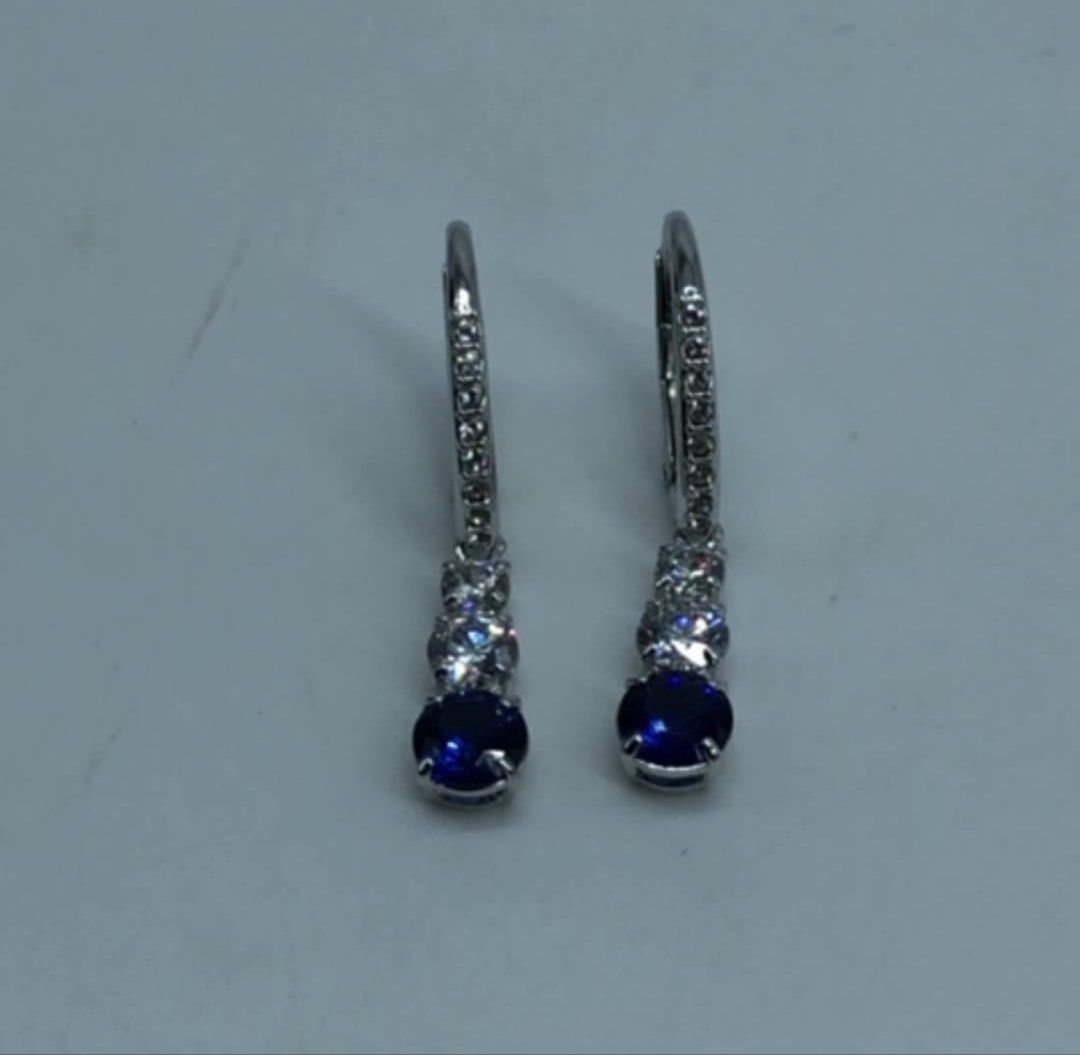 Authentic SWAROVSKI Fashion Dangling Silver Earrings (Category: Luxury Accessories) located in Las Pinas. Submitted by jc_closet (Listing ID 1465589071, Image 3). Description: 💯 Authentic or Money Back Best for Gifts Comes with original box Silver with Blue Crystals Shipping c/o Buyer.