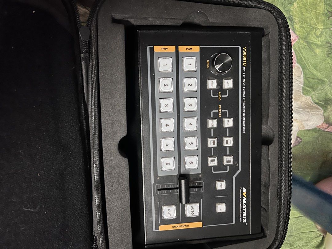 AVMATRIX VS0601U Mini 6-CH Multi-Format Streaming Video Switcher (Category: Office & Business Technology) located in Manila. Submitted by pauleng. (Listing ID 1465713106, Image 1). Description: - Model: AVMATRIX VS0601U multi-format streaming video switcher - Channels: 6-channel setup with intuitive physical buttons and T-bar transition fader - Audio: Integrated audio controls for seamless mixing - Build: Sturdy black metal chassis with anti-slip