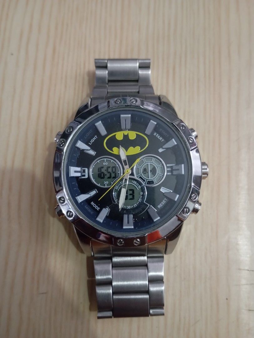 Axn batman (Category: Men's Watches) located in Las Pinas. Submitted by quick_deals_great_finds2 (Listing ID 1465654613, Image 1). Description: Original good working condition Quartz with battery 45mm big size fits wrist 6.8 inches.