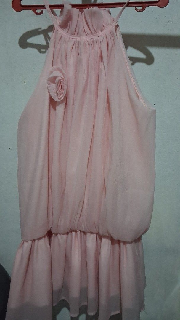 B1T1 Dresses Pink and Green (Category: Dresses) located in Manila. Submitted by boldfish_512666 (Listing ID 1465744247, Image 1). Description: - 👗 Item 1: Light pink sleeveless dress - Material: Layered chiffon - Detail: Floral rosette accent near bottom hem - 🌿 Item 2: Olive green ribbed dress - Material: Stretchy textured fabric - Detail: Shoulder straps with ruffled accents.