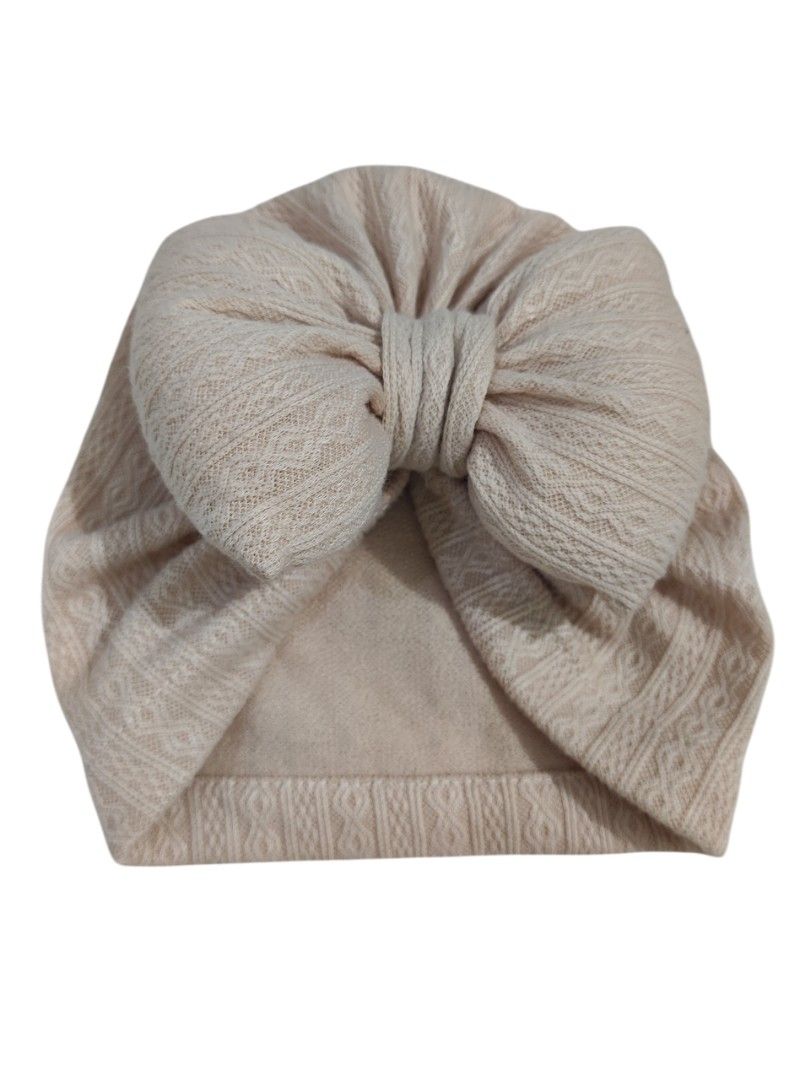 Baby Beanie Hat with Bow Beige (Category: Babies & Kids Fashion) located in Taguig. Submitted by rai.a.c (Listing ID 1465753202, Image 1). Description: Never used .