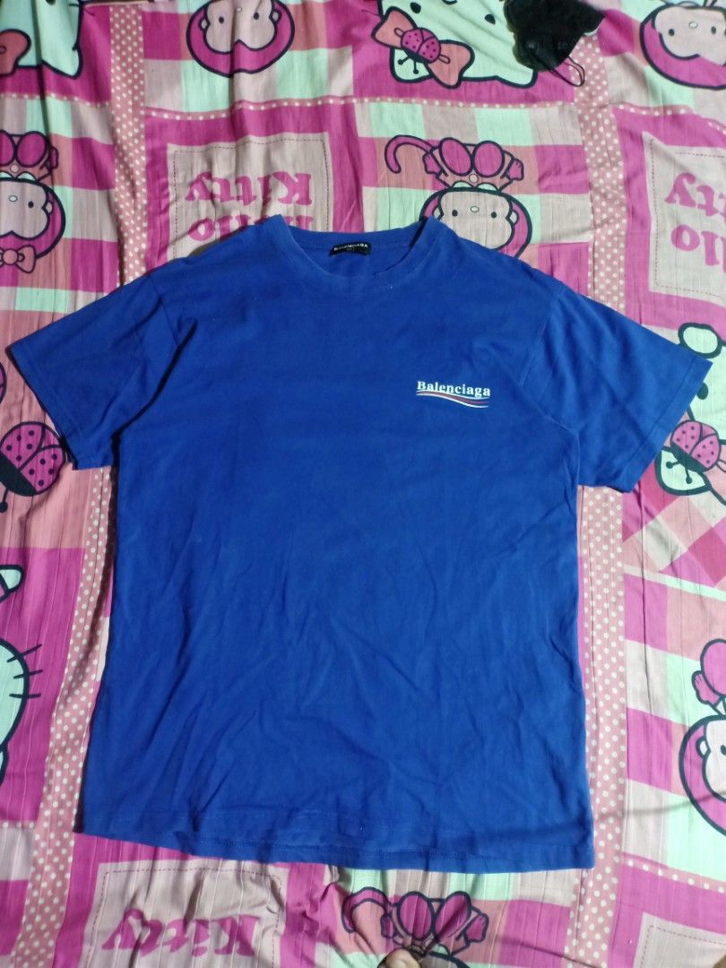 Balenciaga Paris (Category: Tshirts & Polo Shirts ) located in Pasig City. Submitted by thrifttofit (Listing ID 1465599322, Image 1). Description: Balenciaga Paris Size Xs on tag Fit Miduem Condition 8/10 Color rate 9/10 L-26 w-24 Issue Hairline print only No flow or pinhole Pasig city.