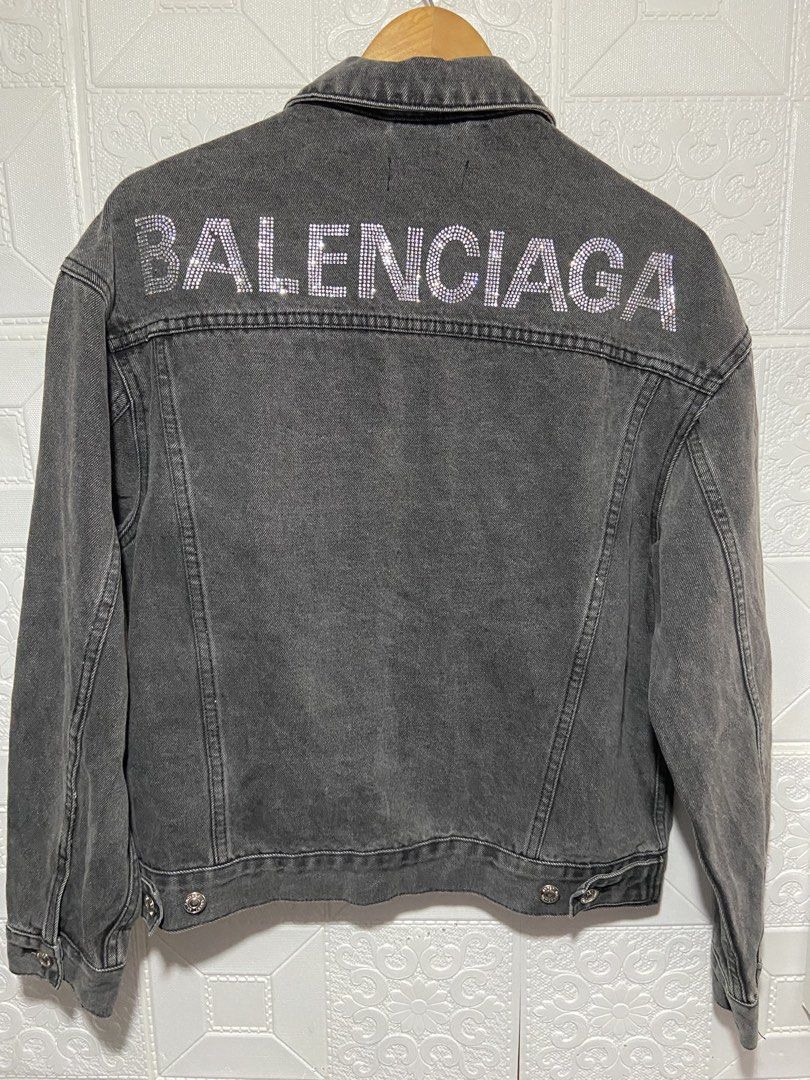 balnciaga emblisshed (Category: Hoodies) located in Baguio. Submitted by stickygarments (Listing ID 1465649415, Image 1). Description: Balenciaga embellish logo denim jacket condition:excellent meduim dimes:22x25 .