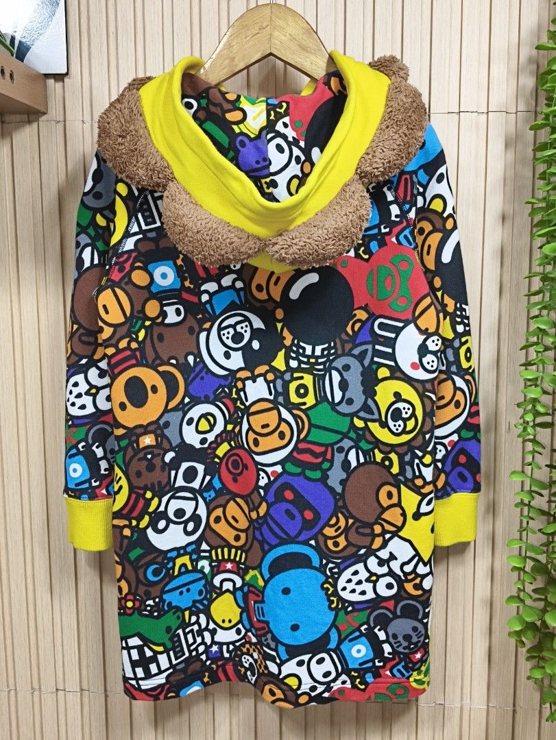 BAPE Kids (Category: Babies & Kids Fashion) located in Quezon City. Submitted by christinejoycheng1 (Listing ID 1465737487, Image 2). Description: - Authentic BAPE Kids multi-color animal print hoodie dress - Features a vibrant all-over graphic pattern with iconic characters, yellow ribbed cuffs and front pocket - Size: Tagged 120 (best fits 6-7 years old).