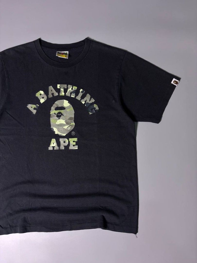 Bape OG College Camo Tee (Category: Tshirts & Polo Shirts ) located in Rizal. Submitted by oldgal.ww (Listing ID 1465625296, Image 2). Description: Bape OG College Camo Tee Medium 19.5" 26" In excellent condition. Minimal hairlines. 1,650.