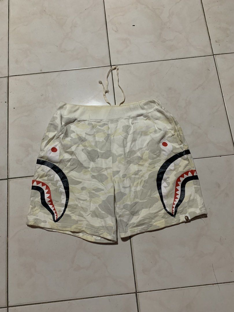 Bape Shark Camouflage Short (off) (Category: Shorts) located in Kabacan. Submitted by mansourrrrrr (Listing ID 1465688200, Image 1). Description: Bape Shark Camouflage Short (Off/Fake) Good for PSG Size: Medium-Large Waistline: 30-34 Length: 18 Leg Opening: 12 Excellent Condition Issue: Need Wash lang po may stain (washable naman).