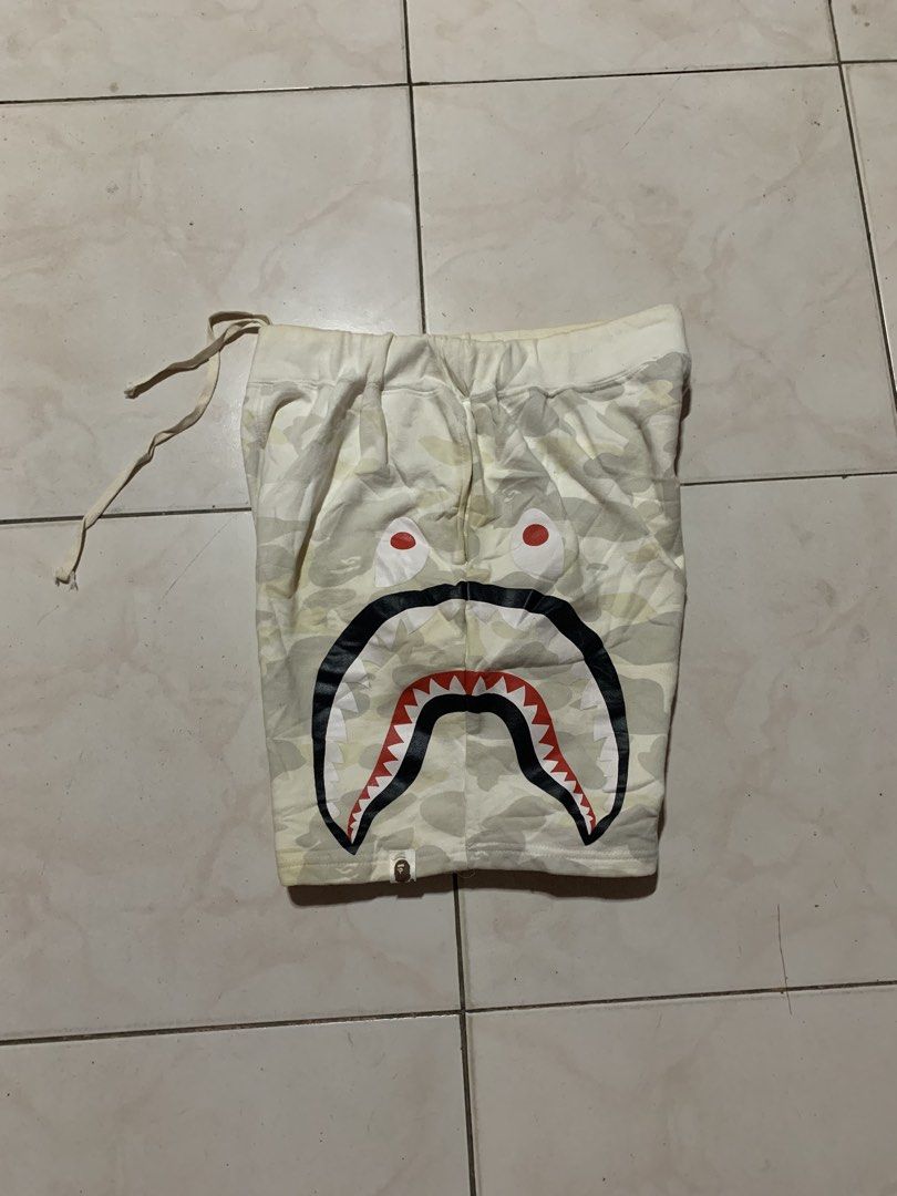 Bape Shark Camouflage Short (off) (Category: Shorts) located in Kabacan. Submitted by mansourrrrrr (Listing ID 1465688200, Image 2). Description: Bape Shark Camouflage Short (Off/Fake) Good for PSG Size: Medium-Large Waistline: 30-34 Length: 18 Leg Opening: 12 Excellent Condition Issue: Need Wash lang po may stain (washable naman).