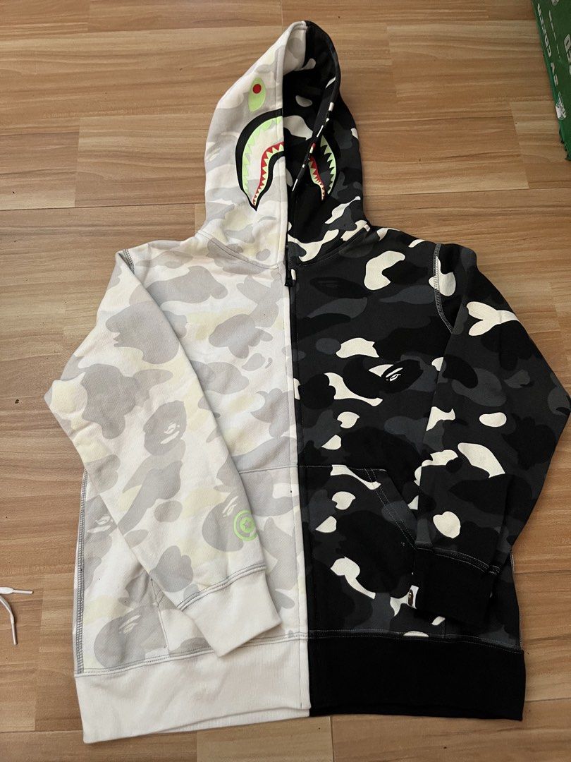 BAPE Shark Full Zip Hoodie Split Camo Black White (Category: Hoodies) located in Victorias. Submitted by lan1877 (Listing ID 1465676259, Image 1). Description: - - Rare split design featuring white camo and black camo - Signature full-zip hood with shark teeth and eye print - 100% premium cotton, made in Japan Issue missing necktag 19W 26L dimension 1500 plus sf - Kids/Youth Size 140 - Clean interior tags showing proper branding and wash instruct