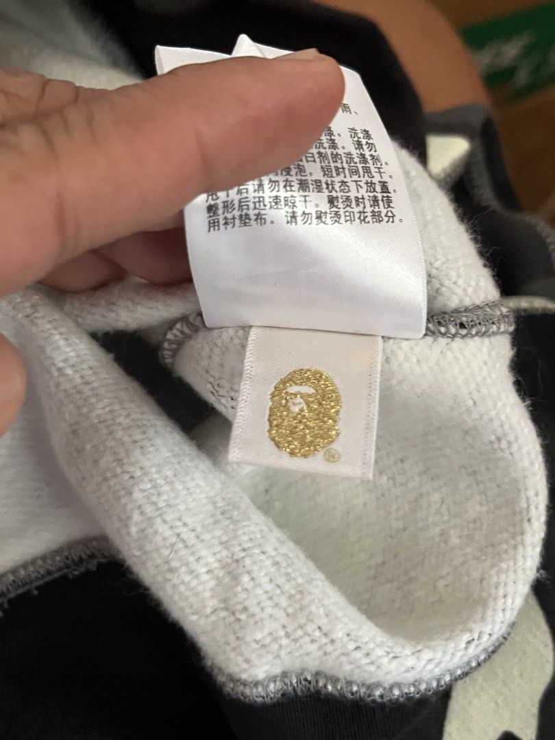 BAPE Shark Full Zip Hoodie Split Camo Black White (Category: Hoodies) located in Victorias. Submitted by lan1877 (Listing ID 1465676259, Image 3). Description: - - Rare split design featuring white camo and black camo - Signature full-zip hood with shark teeth and eye print - 100% premium cotton, made in Japan Issue missing necktag 19W 26L dimension 1500 plus sf - Kids/Youth Size 140 - Clean interior tags showing proper branding and wash instruct