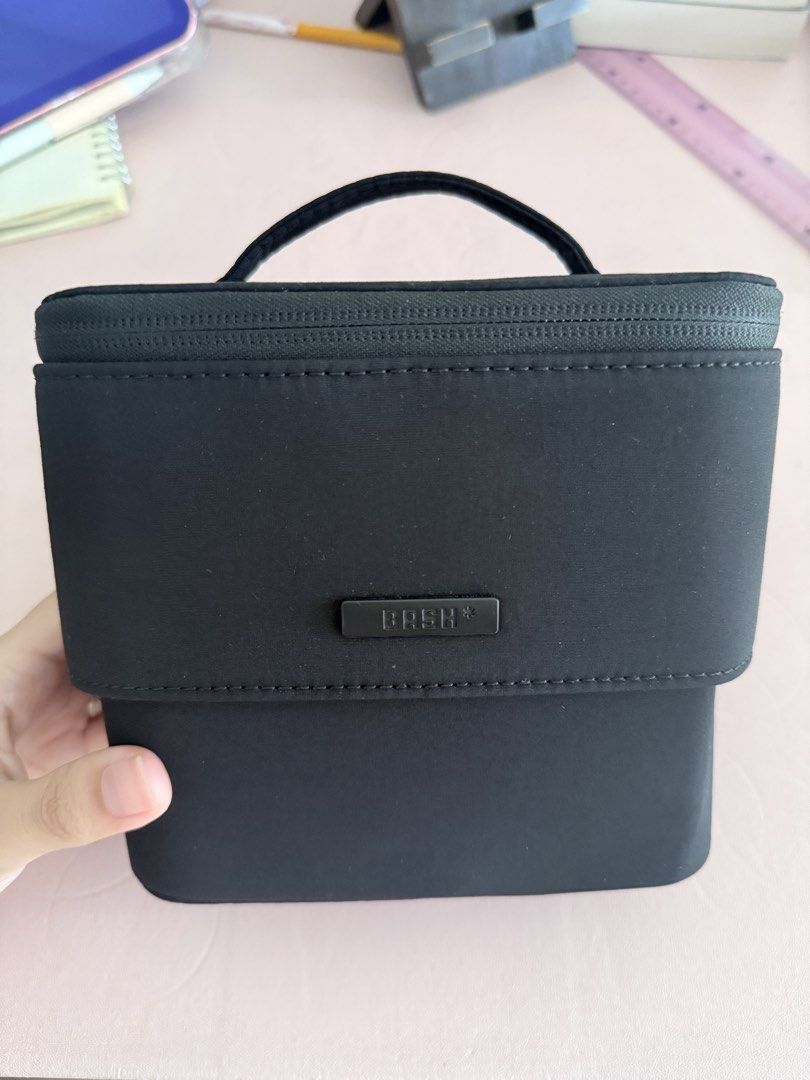 BASH Mini Flex Organizr (Category: Accessory Holder, Box & Organizers) located in Manila. Submitted by jdees_ (Listing ID 1465586830, Image 2). Description: - Brand: BASH (Good as new) bought last month only - Color: Carbon (Black) - Design: Structured rectangular shape with a convenient top handle and secure double zippers - Details: Debossed BASH logo plaque on the front and a minimal symbol on the back - Material: Sturdy fabric construction bu
