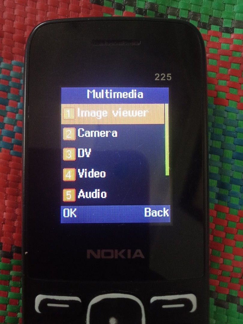 Basic Dual Sim Phone with a Memory Card Slot (Category: Early Generation Mobile Phones) located in Rizal. Submitted by mnmarquez2 (Listing ID 1465540817, Image 3). Description: - can call and can text - can receive calls and text messages - has a memory card slot - with a dual sim feature - has torch - has a camera - can record and can watch videos - has a built-in music player - has bluetooth - has a built-in radio - can connect to the internet 
