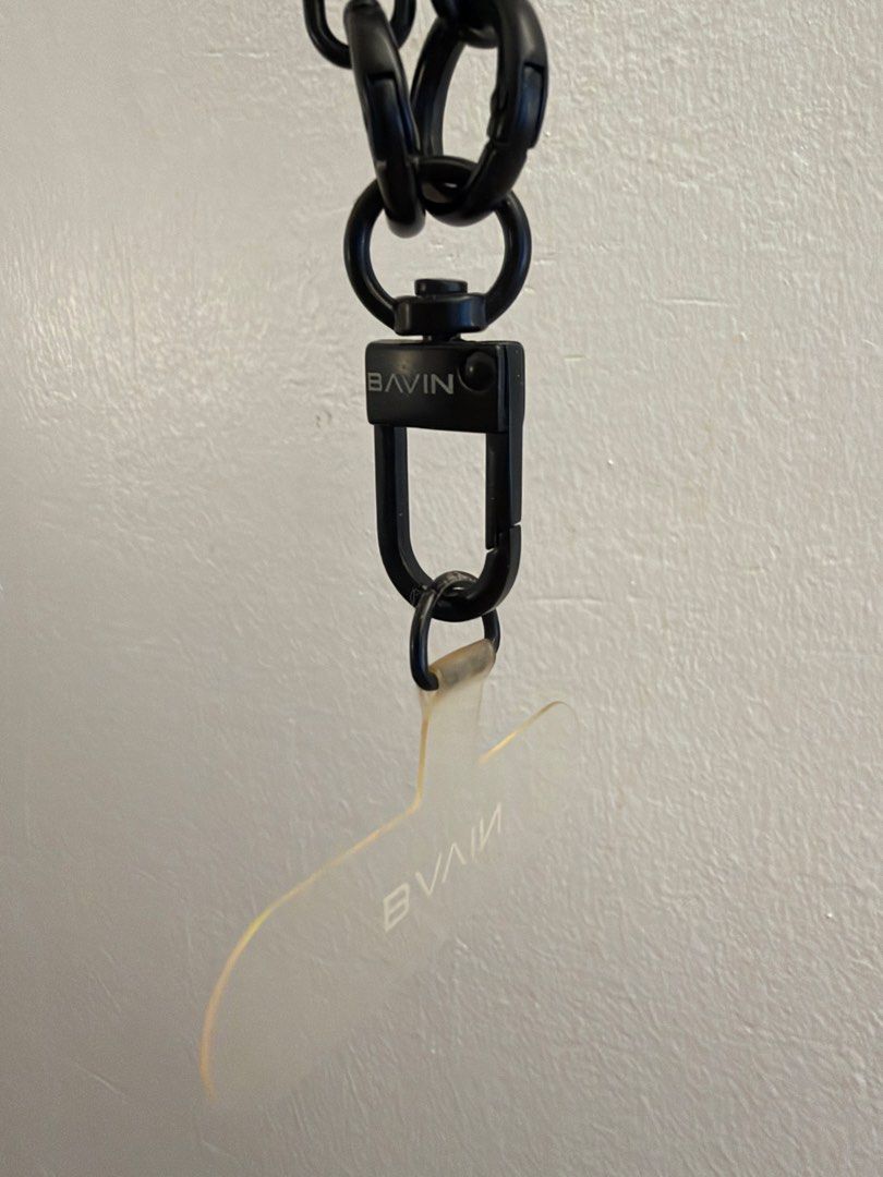 BAVIN Dark Green Phone Lanyard Strap (Category: Wearables & Smart Watches) located in Pasay City. Submitted by sevnco (Listing ID 1465755526, Image 2). Description: - Brand: BAVIN - Color: Dark Green (Woven rope style) - Includes: Black hardware clips & clear phone tether tab - Feature: Adjustable standard length - Benefit: Keep your phone handy and enjoy hands-free convenience while on the go.